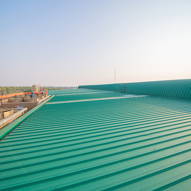 Empty space of metal sheet corrugated roof on rooftop of industry factory. Steel structure of modern station building roof. Metal. architecture design background.